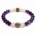 8mm Amethyst and Rose Quartz stretch bracelet with purple and pale pink beads, silver tone Buddha head and decorative accents