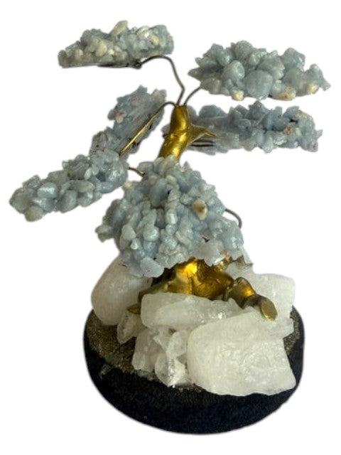 Crystal Fairy Patch Angelite bonsai tree with sky-blue crystal leaves on a natural quartz and pyrite-coated base.