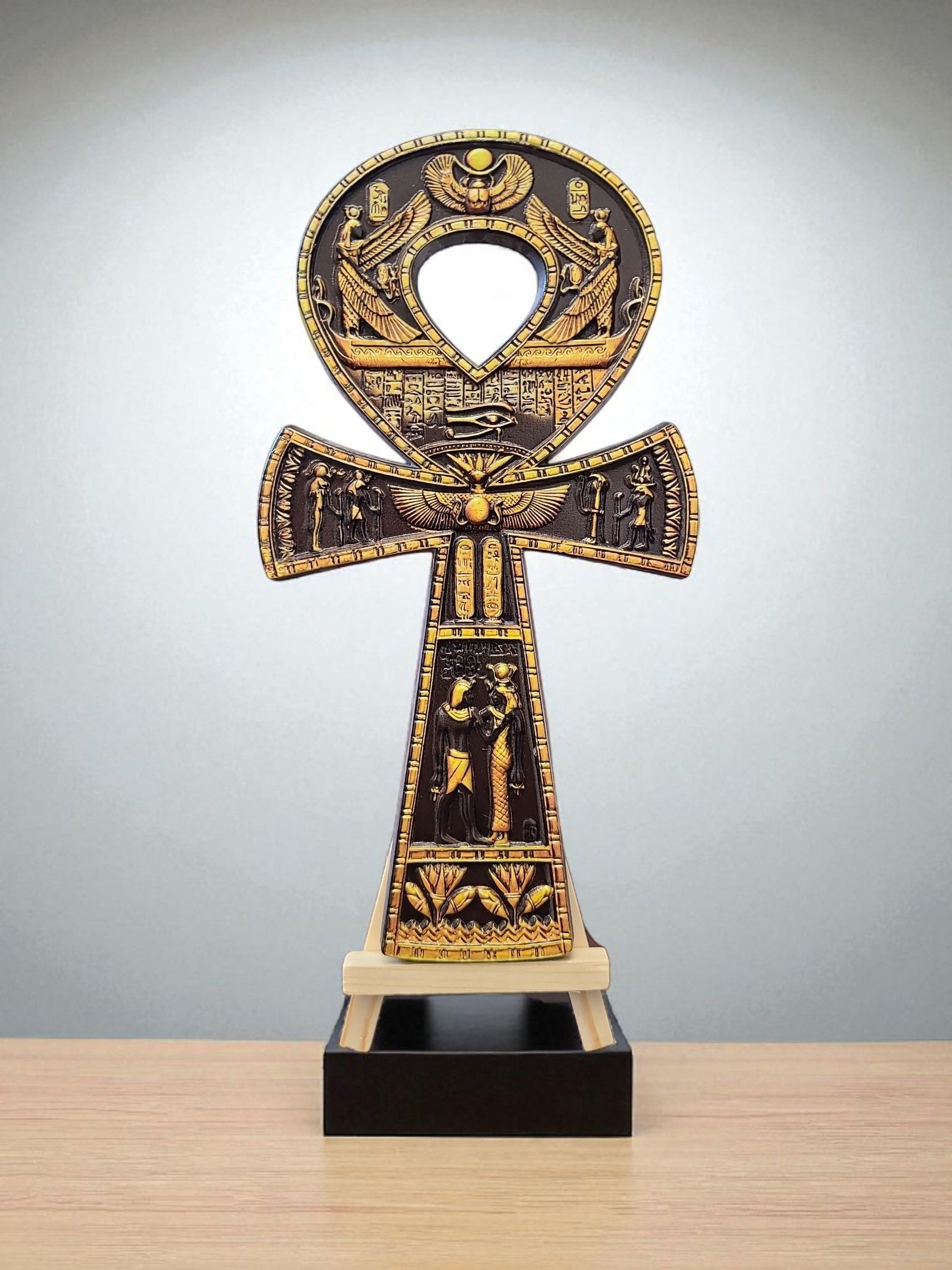 Crystal Fairy Patch 8-inch resin Ankh symbol in black and yellow with intricate Egyptian hieroglyphics and Eye of Horus detail.