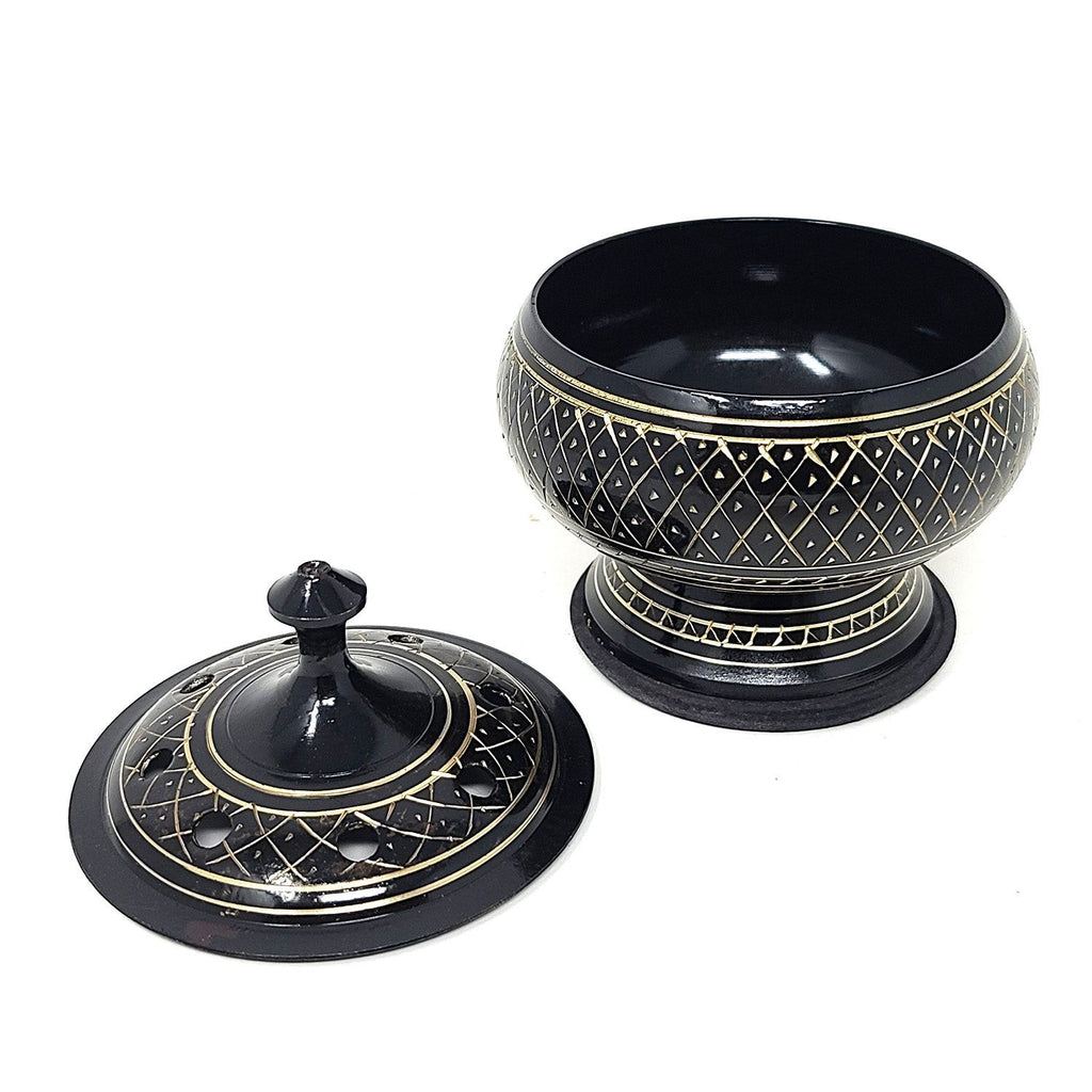 Crystal Fairy Patch black carved brass incense burner with intricate gold-tone etching, lid, and wooden coaster base.