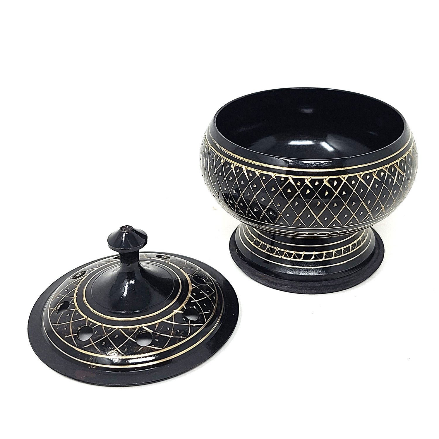 Crystal Fairy Patch black carved brass incense burner with intricate gold-tone etching, lid, and wooden coaster base.