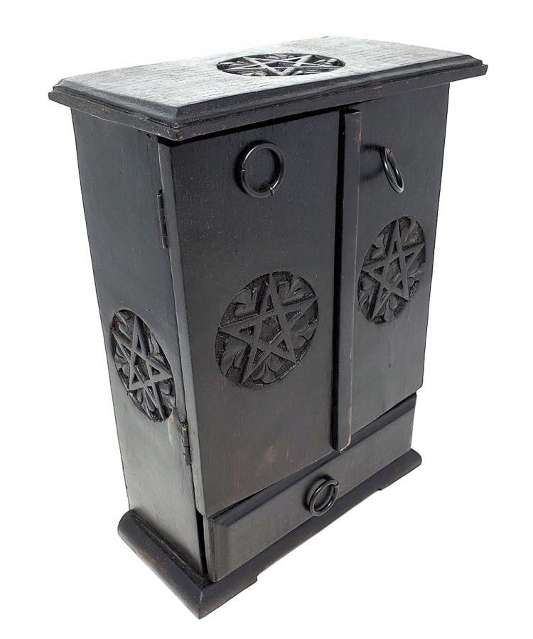 Crystal Fairy Patch black wooden cupboard with hand-carved pentagram motifs, metal ring pulls, and a storage drawer.