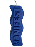 Crystal Fairy Patch blue sculptural candle with wavy silhouette and raised MANIFEST lettering for meditation and decor