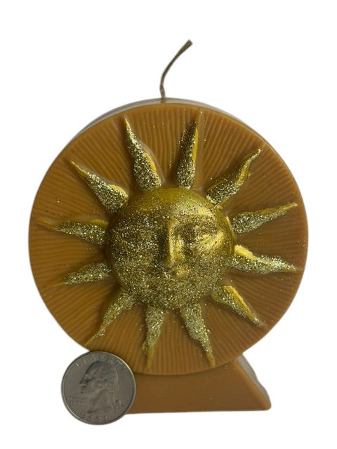 Crystal Fairy Patch Golden Sun Handcrafted Candle in honey wax with embossed sun face and shimmering gold glitter accents.