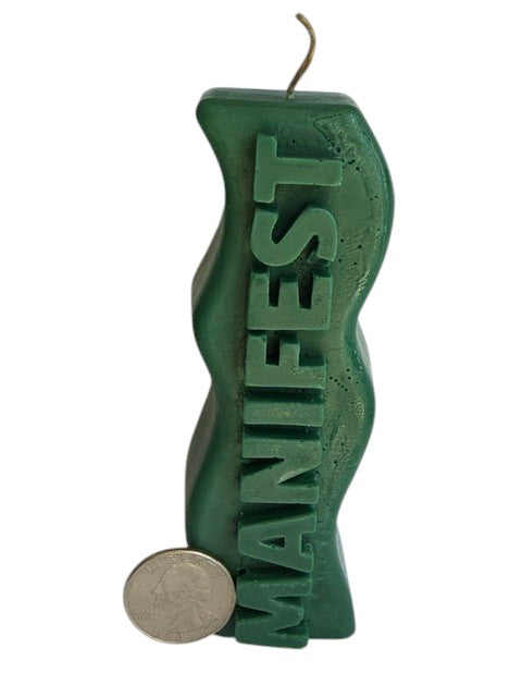 Crystal Fairy Patch handcrafted green wavy candle with raised MANIFEST lettering for meditation and spiritual decor.