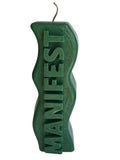 Crystal Fairy Patch green sculptural candle with wavy silhouette and raised MANIFEST lettering for meditation and decor.
