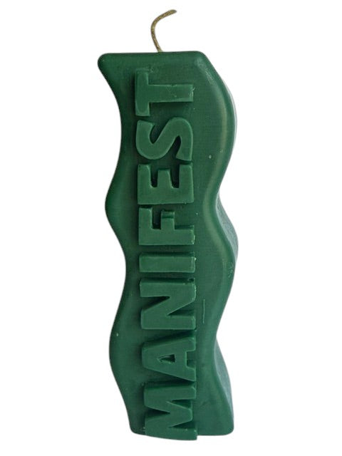 Crystal Fairy Patch green handcrafted sculptural candle with a wavy silhouette and raised MANIFEST lettering for meditation.