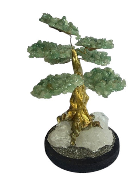 Crystal Fairy Patch jade bonsai tree with green gemstone leaves, gold-toned trunk, and a base of clear quartz and pyrite crystals.