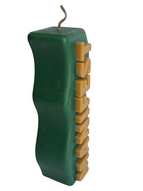 Crystal Fairy Patch handcrafted green sculptural candle with beige raised MANIFEST lettering and a wavy silhouette.