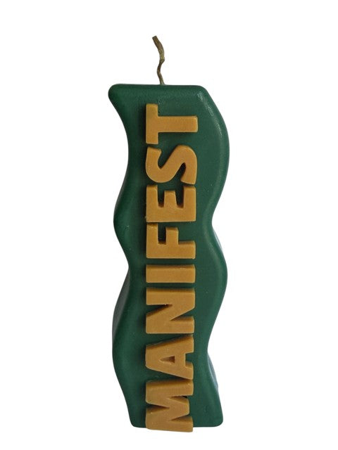 Crystal Fairy Patch handcrafted green wavy pillar candle with beige raised MANIFEST lettering for meditation and decor.