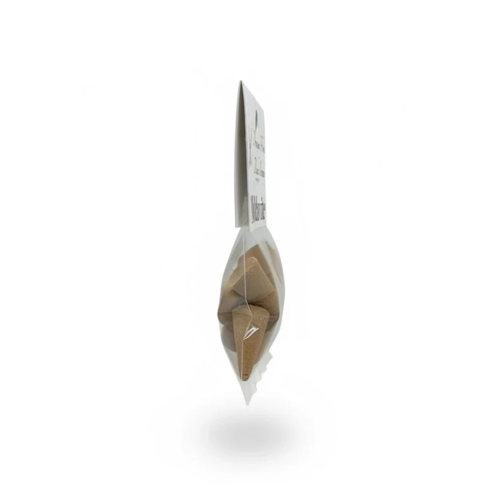 Crystal Fairy Patch Moldavite premium hand-made cone incense in a clear plastic packaging, side profile view.