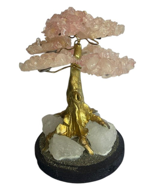 Crystal Fairy Patch rose quartz bonsai tree with gold trunk on a raw quartz and pyrite base for home decor and meditation.