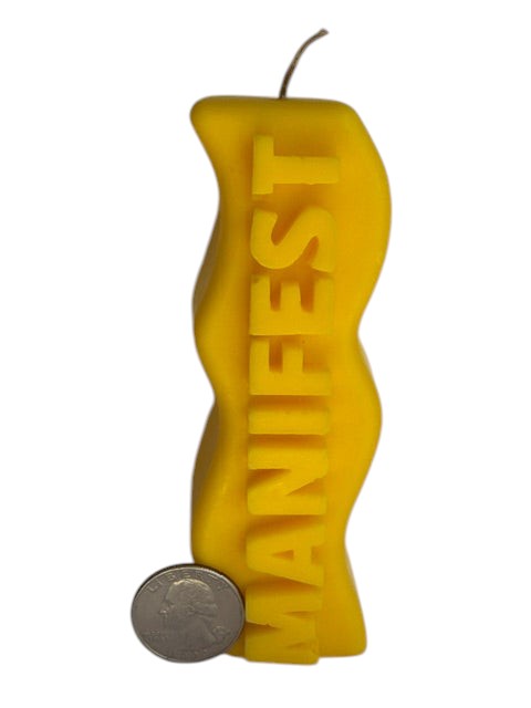 Crystal Fairy Patch yellow handcrafted sculptural candle with wavy silhouette and raised MANIFEST lettering for meditation.