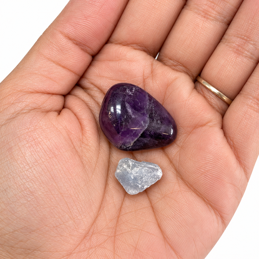Aquarius Amethyst and rough Celestite in an open palm for size