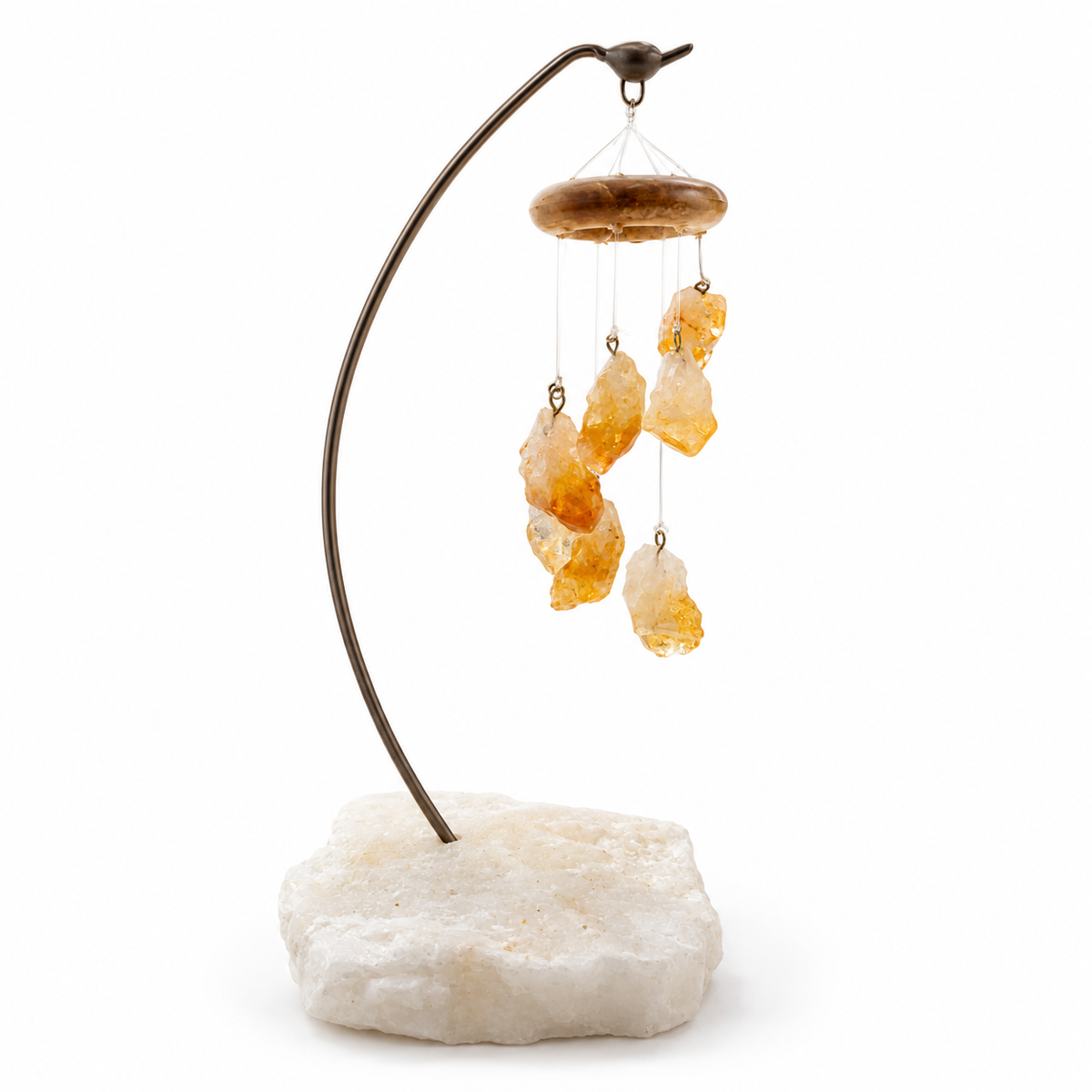 Citrine point desk chime with curved metal stand and rough white quartz base