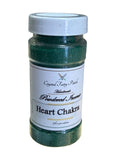 Crystal Fairy Patch Heart Chakra powdered incense in a clear container with a white lid. Green incense powder with herbs.