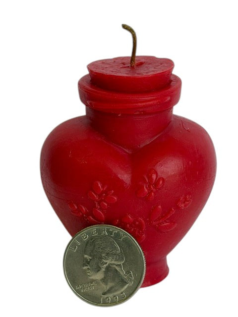 Crystal Fairy Patch handcrafted red heart-shaped love potion bottle candle with embossed floral details and stopper top.