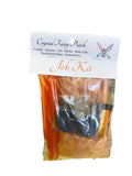 Crystal Fairy Patch Job Ritual Kit with orange candle, herbs, incense, oil, bath crystals, and charcoal.