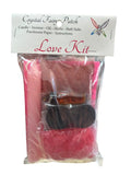 Crystal Fairy Patch Love Ritual Kit with pink candle, herbs, incense, oil, bath crystals, and parchment.