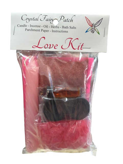 Crystal Fairy Patch Love Ritual Kit with pink candle, herbs, incense, oil, bath crystals, and parchment.