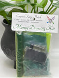 Crystal Fairy Patch Money Drawing Ritual Kit with green candle, incense, oil, herbs, bath salts, and parchment.