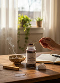 Crystal Fairy Patch New Beginnings powdered incense in a glass jar with a hand scooping powder for a fresh start ritual.