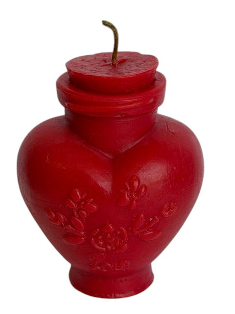 Crystal Fairy Patch red heart-shaped love potion bottle candle with embossed floral details and a vintage apothecary stopper.