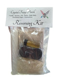 Crystal Fairy Patch Reversing Ritual Kit with candle, herbs, incense, oil, bath crystals, and charcoal.