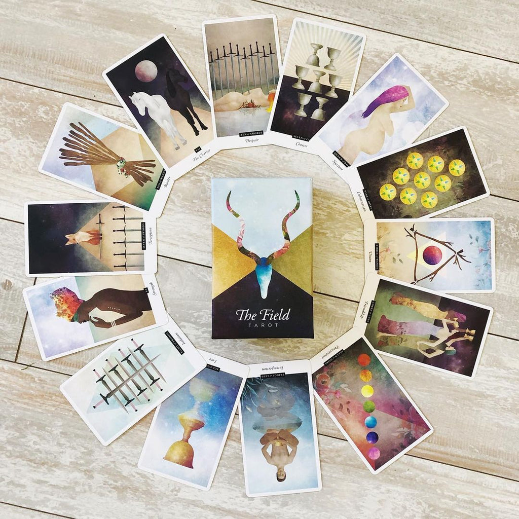The Field Tarot cards arranged around the deck box