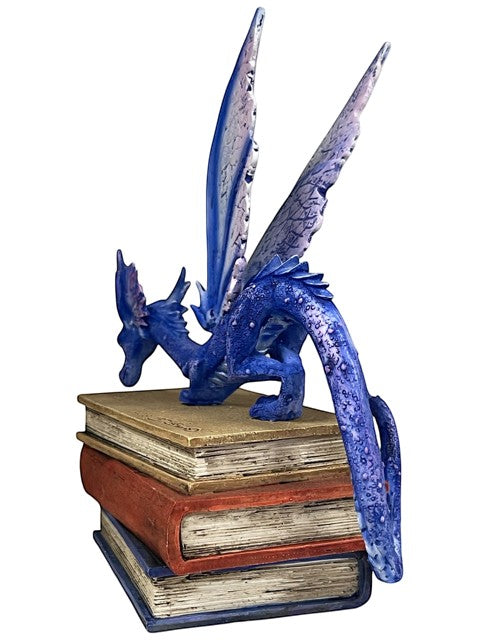 My Store Indigo Book Dragon Figurine perched on stack of antique books, detailed indigo scales, purple and pink wings.