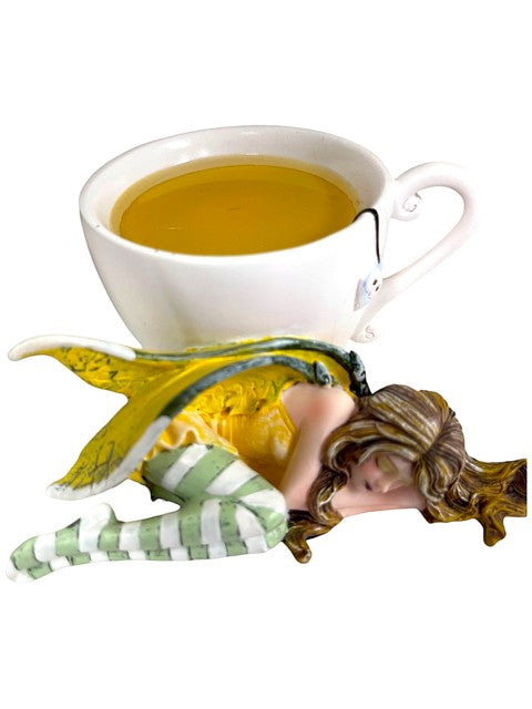 My Store Amy Brown Chamomile Fairy Tea Figurine, sleeping fairy with yellow wings and green striped leggings.