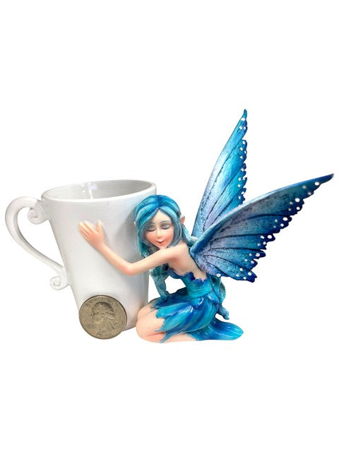 My Store Amy Brown Coffee Comfort Relaxing Faery Cup figurine hugging a white mug. Blue fairy with detailed wings.