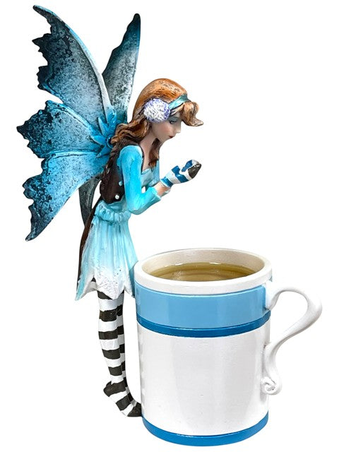 My Store Amy Brown Hot Cocoa Faery Cup figurine holding a mug of hot cocoa. Features blue wings and striped stockings.