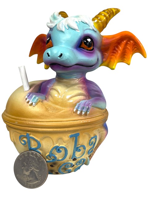 My Store Boba Tea with George figurine, a blue and purple dragon with orange wings, sitting in a boba tea cup.