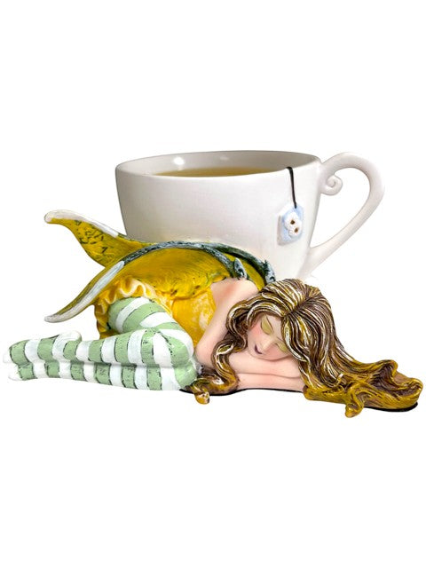 My Store Amy Brown Chamomile Fairy Tea Figurine, sleeping fairy with yellow wings and green striped stockings.