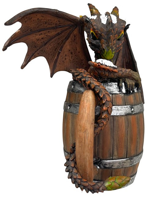 My Store Dark Beer Dragon figurine by Stanley Morrison, perched on a wooden barrel with metal bands. Detailed wings and scales.