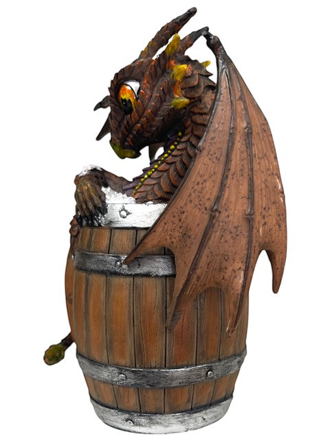 My Store Dark Beer Dragon figurine by Stanley Morrison peeking out of a wooden barrel with silver bands.