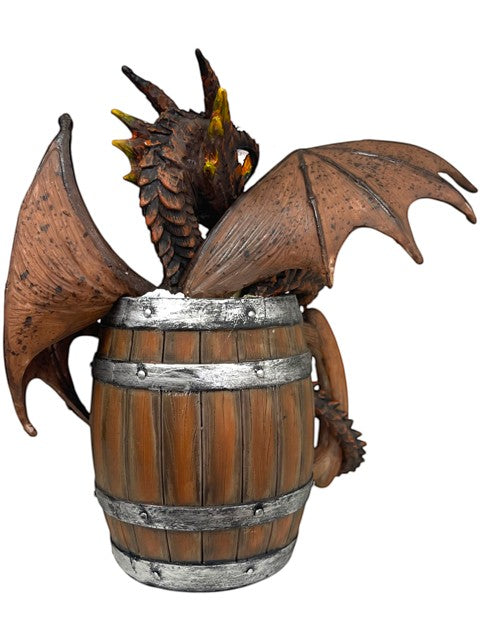 My Store Dark Beer Dragon figurine by Stanley Morrison emerging from a wooden barrel with metal bands.