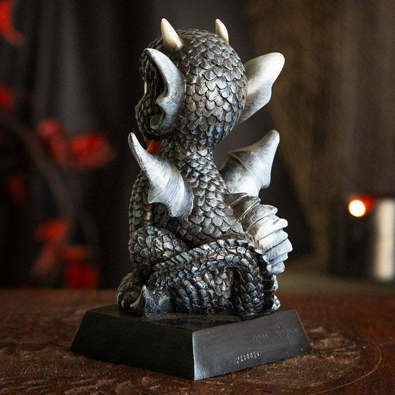 My Store black dragon figurine with intricate scales, wings, and horns, sitting on a base.