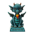 My Store teal blue dragon figurine with intricate scales, wings, and a motivational quote on its base.