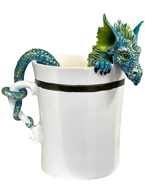 My Store white ceramic mug with a teal and green dragon sculpture wrapped around the handle and peeking over the rim.