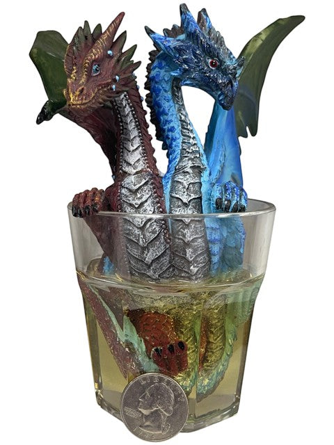 My Store Drinks and Dragons Series "Gin and Tonic" dragon figurine by Stanley Morrison. Red and blue dragons emerging from a glass of amber liquid.
