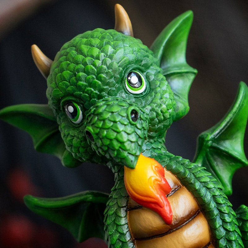 My Store green dragon figurine with wings breathing fire, featuring "Your Fantastic Dreams Have Wings" quote. Resin.
