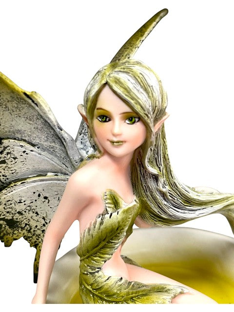 My Store Green Tea Fairy figurine with delicate wings, flowing blonde hair, and green eyes, wearing a leaf-like dress.
