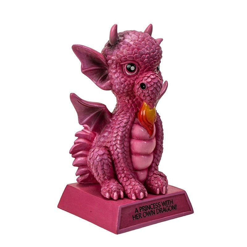 My Store pink dragon figurine with intricate scales, wings, and a base inscribed "A Princess With Her Own Dragon!".