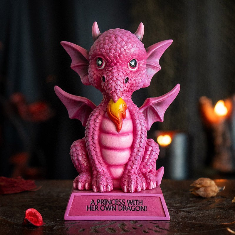 My Store pink resin dragon figurine with wings, horns, and fire breath. Inscribed base reads "A Princess With Her Own Dragon!"