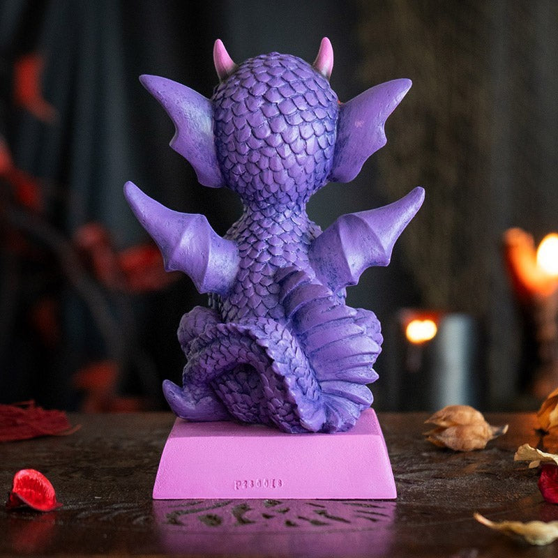 My Store purple dragon figurine with intricate scales, wings, and pink horns. Features "She's Cute But Fierce" quote on base.