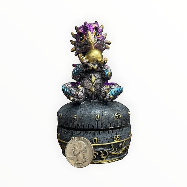 My Store purple dragon with golden egg mechanical kitchen timer, made of polyresin. Measures 4.75" tall.