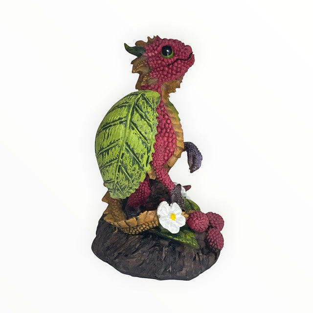 My Store Green Thumb Garden Raspberry Dragon figurine by Stanley Morrison, a red dragon with a green leaf wing, holding a white flower.