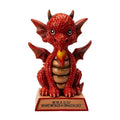 My Store red dragon figurine with "W.W.A.D.D. What Would A Dragon Do?" inscription on base. Resin.